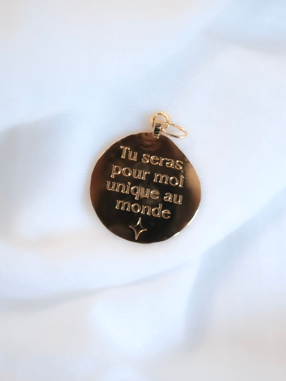 Pendentif "Unique au monde"