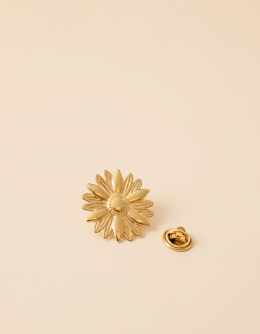 Broche de fleur de marguerite en plastique souple vintage des années