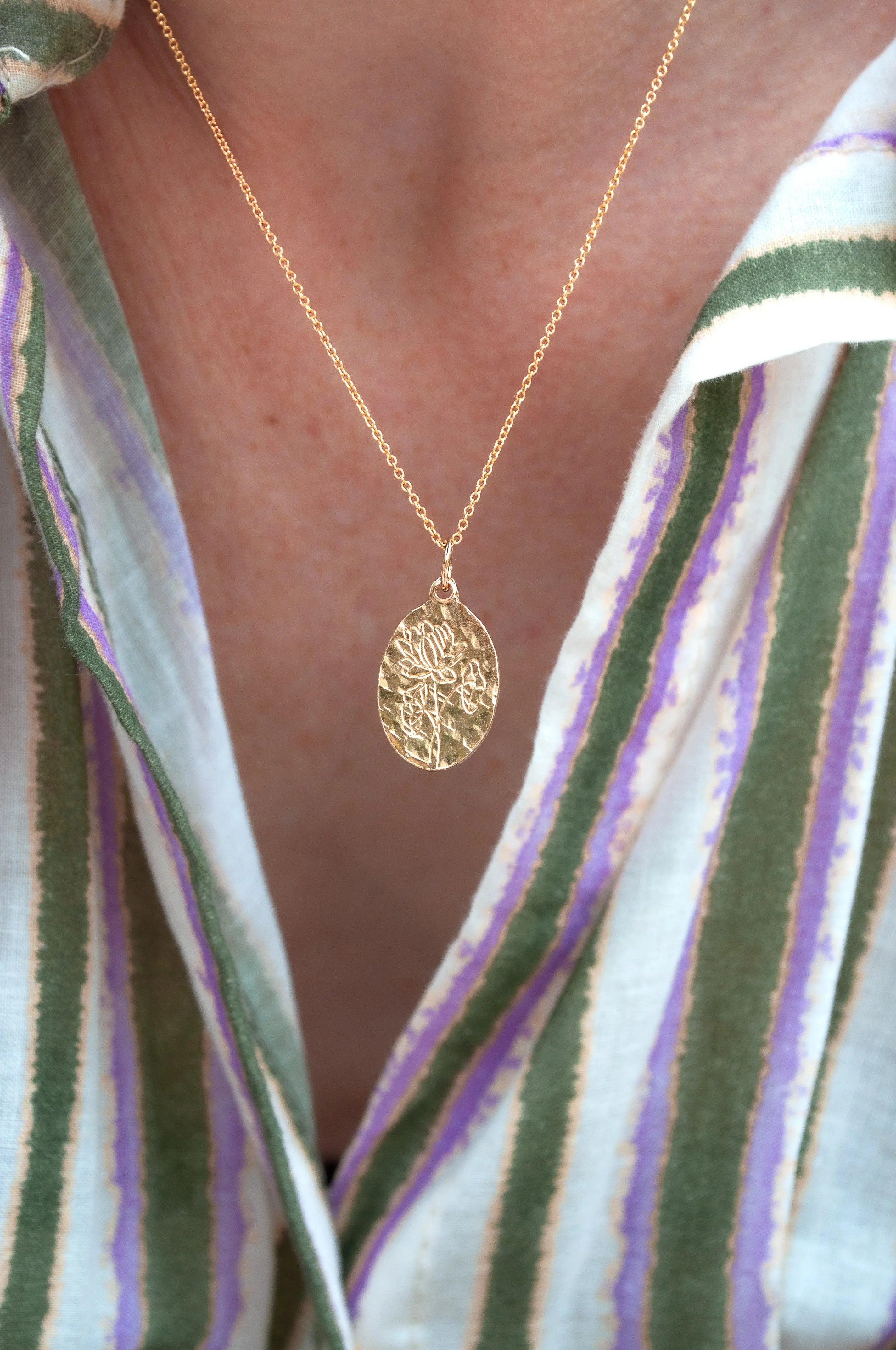 Pendentifs "Fleur de Naissance" Un de ces quatre