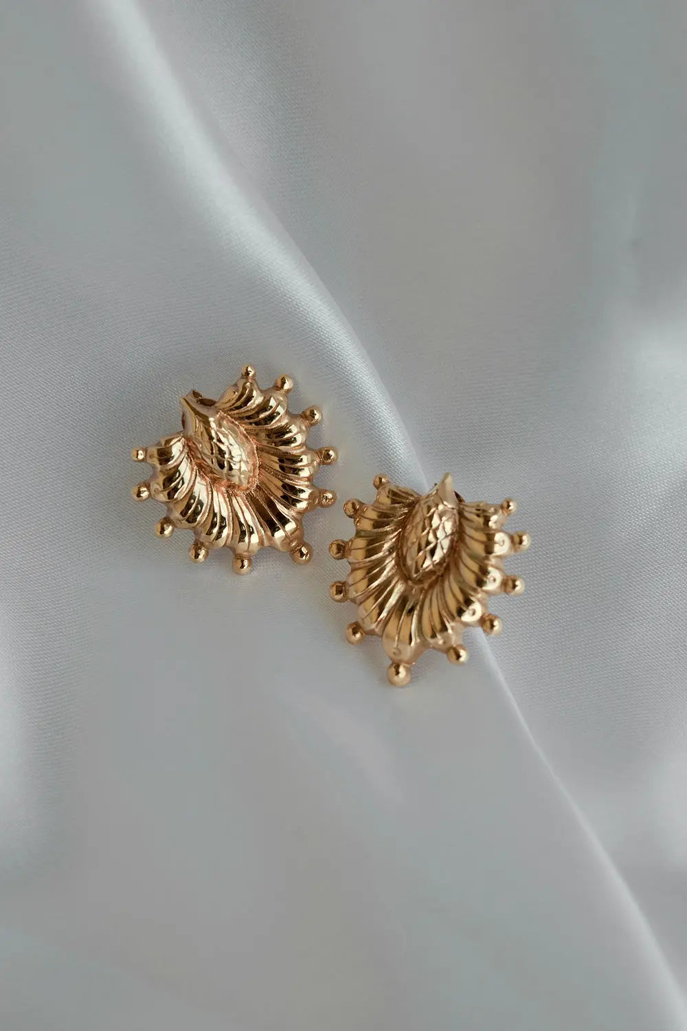 Boucles Palmettes Un de ces quatre 